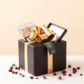 Cutie cadou corporate premium, neagră cu fundă aurie și produse gourmet – cadou de business Egoodies