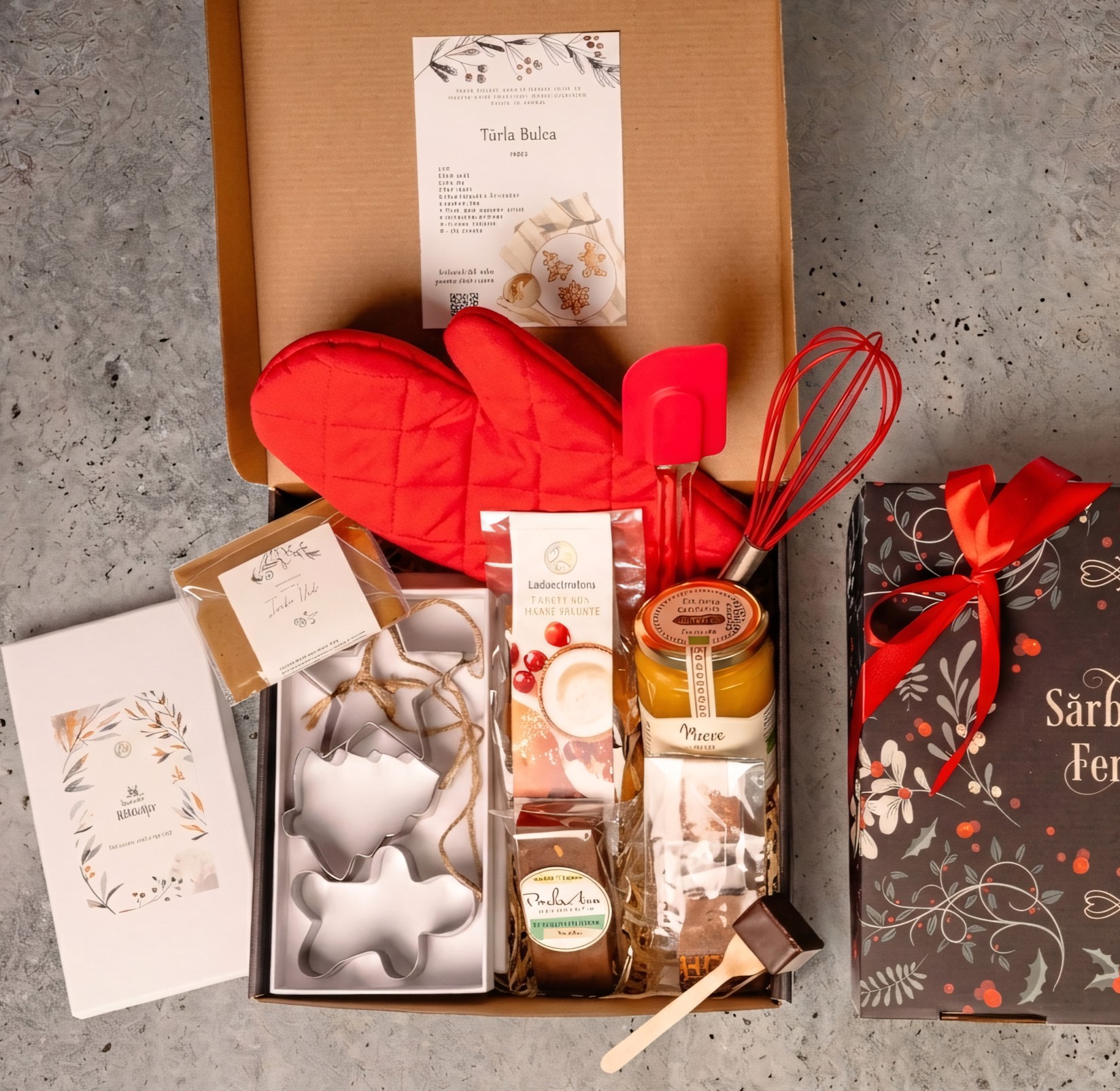 cadou-craciun-DIY-kit-turta -dulce cutie cadou cu forme pentru turta dulce de inox, condimente pentru turta dulce, reteta turta dulce, ustensile de gatit rosii - manusa, tel, spatula, miere de albine, ciocolata calda pe bat, biscuiti cu merisoare